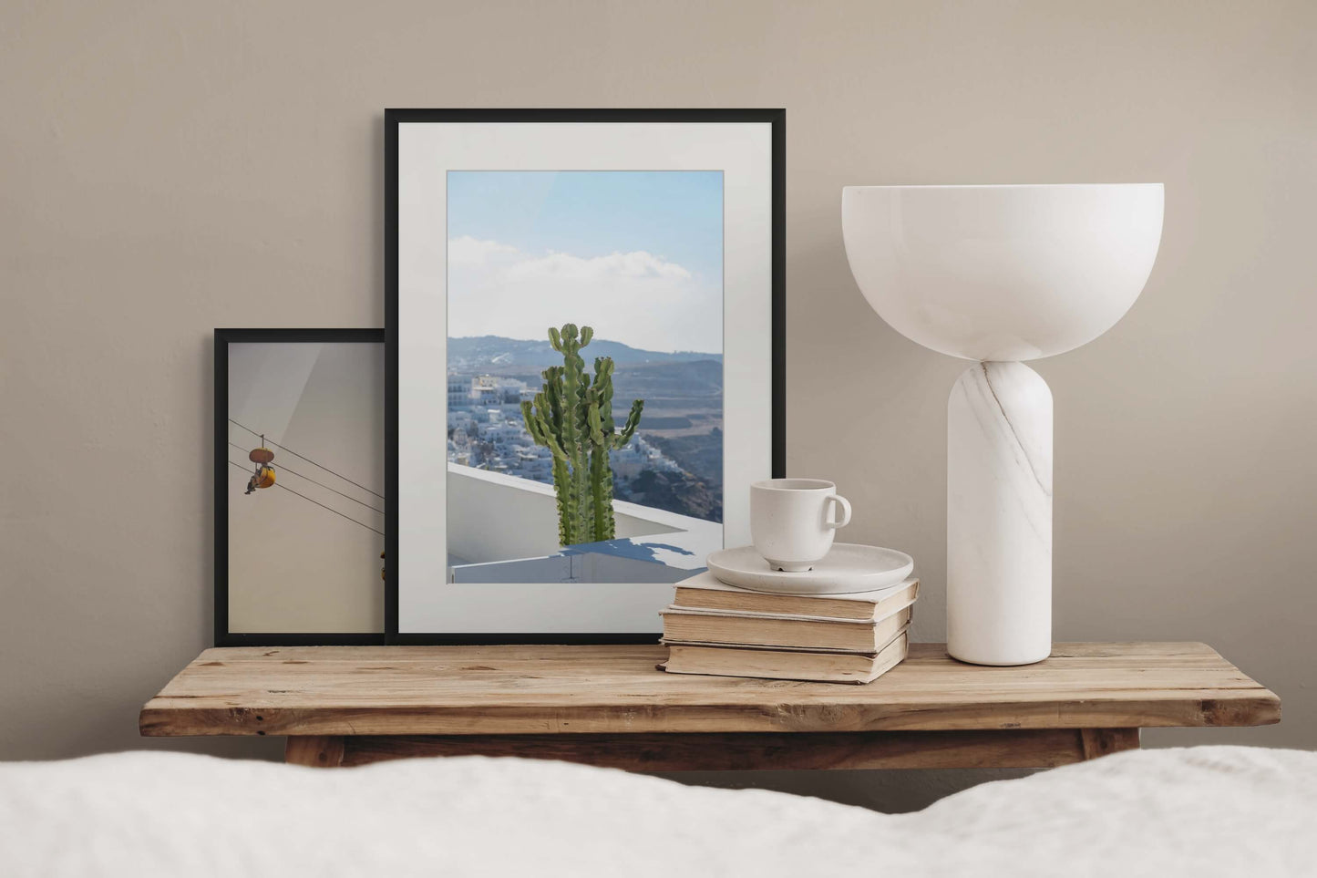 Santorini Cactus by Erica Goldemberg with black frame in a bedroom mockups